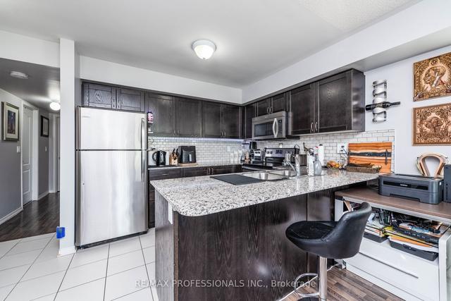 601 - 140 Widdicombe Hill Blvd, Townhouse with 2 bedrooms, 2 bathrooms and 1 parking in Toronto ON | Image 4