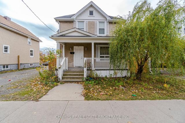 100 Queenston St, House detached with 5 bedrooms, 2 bathrooms and 4 parking in St. Catharines ON | Image 1