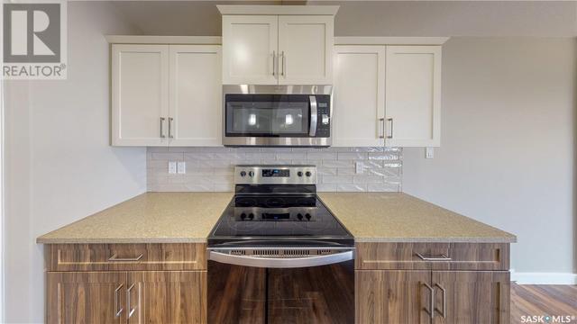218 Schmeiser Bend, House semidetached with 3 bedrooms, 3 bathrooms and null parking in Saskatoon SK | Image 6