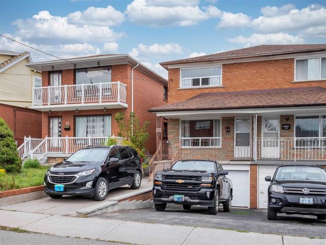 35 Robinson Ave, House semidetached with 3 bedrooms, 2 bathrooms and 2 parking in Toronto ON | Image 1