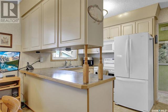 74 Cooper Cres, House detached with 4 bedrooms, 2 bathrooms and null parking in Regina SK | Image 7