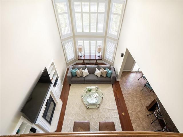Soaring ceilings with views to the upper level. | Image 6