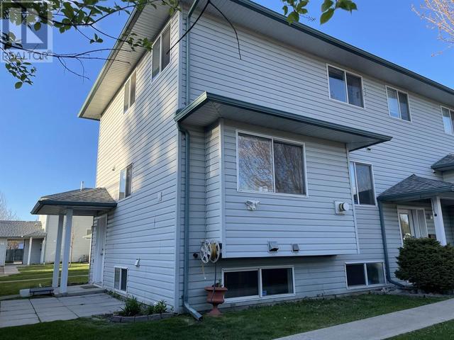 102 - 2423 8th Ave, House attached with 2 bedrooms, 3 bathrooms and null parking in Prince George BC | Image 1