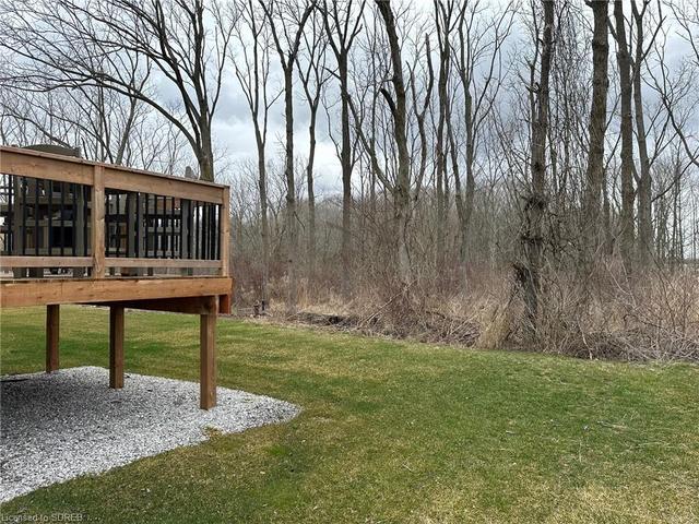 Nature (and privacy) lovers will love the picturesque views from the 14' x 10' backyard deck, a lovely spot to take in the beauty of nature, listening and watching an abundance of birds with an occasi | Image 23