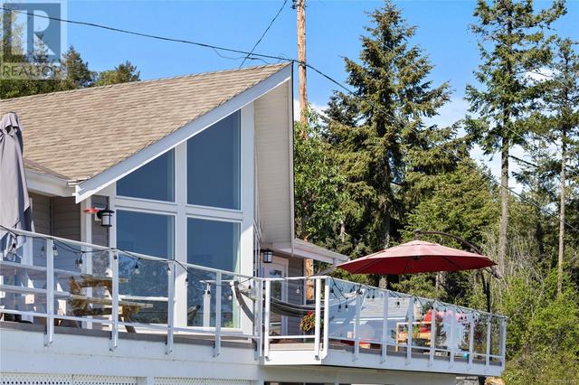 8475 Lisa Lane, House detached with 4 bedrooms, 3 bathrooms and 8 parking in Lantzville BC | Image 44
