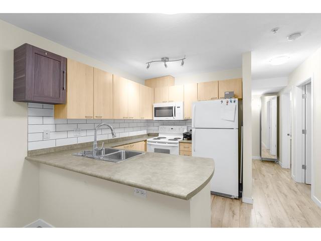 103 - 12083 92a Ave, Condo with 2 bedrooms, 2 bathrooms and 1 parking in Surrey BC | Image 19