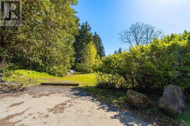 2nd driveway to an almost 1 acre parcel with its onw title | Image 27