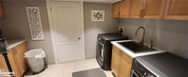 Well Appointed Laundry Room | Image 17