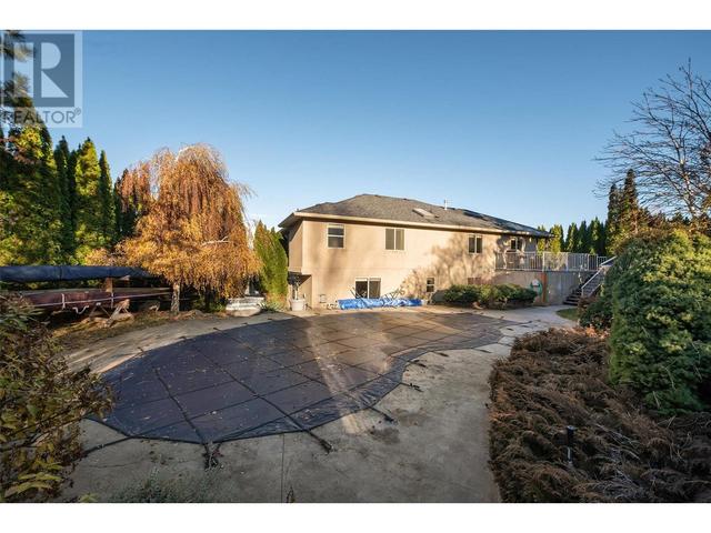 291 Sandpiper Crt, House detached with 5 bedrooms, 3 bathrooms and 6 parking in Kelowna BC | Image 74