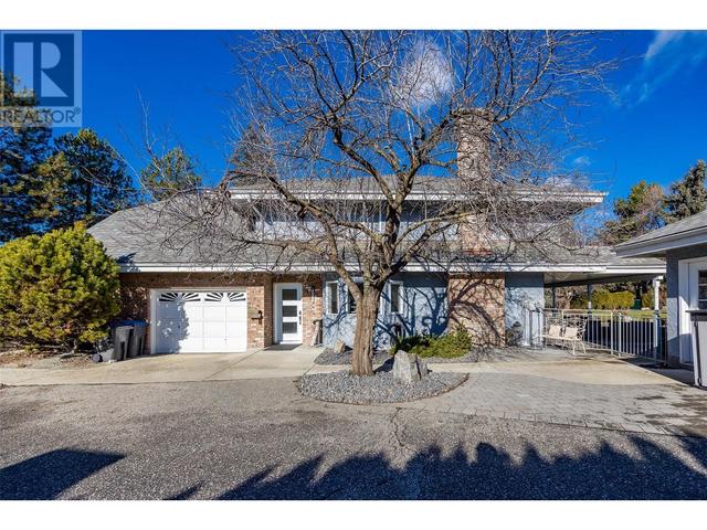 1610 Highland Dr N, House detached with 4 bedrooms, 2 bathrooms and 2 parking in Kelowna BC | Image 2