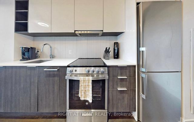 418 - 31 Tippett Rd, Condo with 1 bedrooms, 2 bathrooms and 1 parking in Toronto ON | Image 3