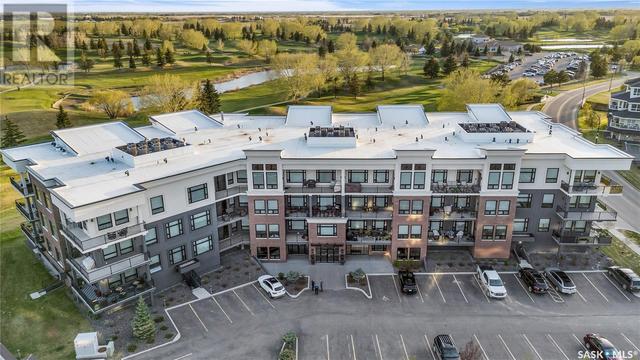 111 - 404 Cartwright St, Condo with 2 bedrooms, 2 bathrooms and null parking in Saskatoon SK | Image 1