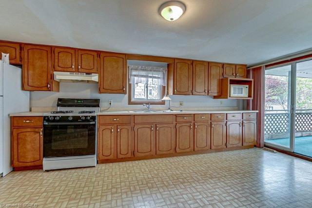 Kitchen with gas fireplace | Image 11