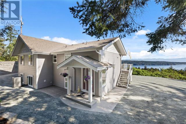 8475 Lisa Lane, House detached with 4 bedrooms, 3 bathrooms and 8 parking in Lantzville BC | Image 46