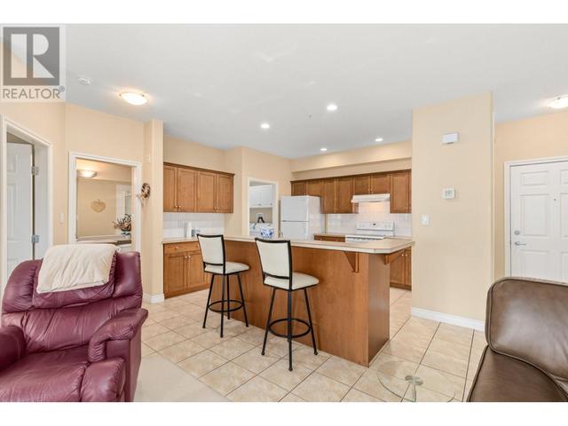 106 - 1961 Durnin Rd, Condo with 2 bedrooms, 2 bathrooms and 1 parking in Kelowna BC | Image 4