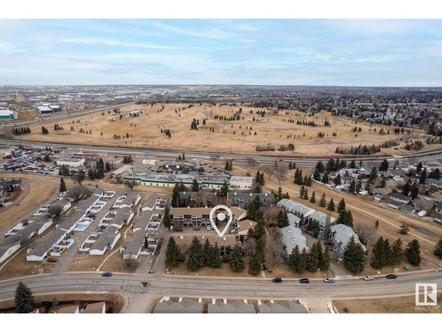 1035 Millbourne Rd E Nw, House attached with 3 bedrooms, 1 bathrooms and 2 parking in Edmonton AB | Image 2