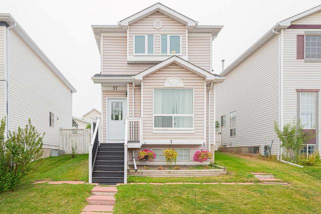 57 Millrise Mews Sw, House detached with 4 bedrooms, 2 bathrooms and 4 parking in Calgary AB | Image 1