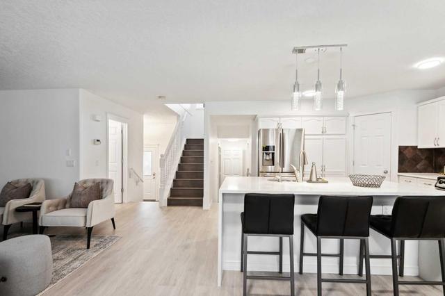 12431 Crestmont Blvd Sw, House detached with 4 bedrooms, 3 bathrooms and 4 parking in Calgary AB | Image 8