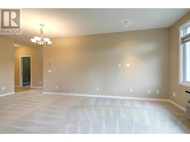 104 - 1350 Ridgeway Dr, Condo with 2 bedrooms, 2 bathrooms and 1 parking in Kelowna BC | Image 16