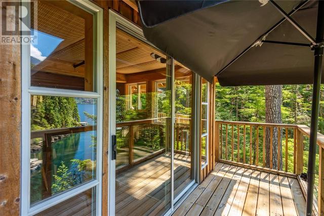 42 Baikie Dr, House detached with 2 bedrooms, 1 bathrooms and 2 parking in Strathcona D (Oyster Bay   Buttle Lake) BC | Image 11