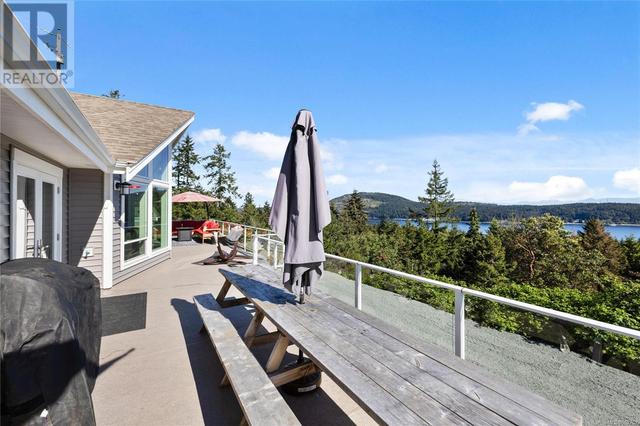 8475 Lisa Lane, House detached with 4 bedrooms, 3 bathrooms and 8 parking in Lantzville BC | Image 45