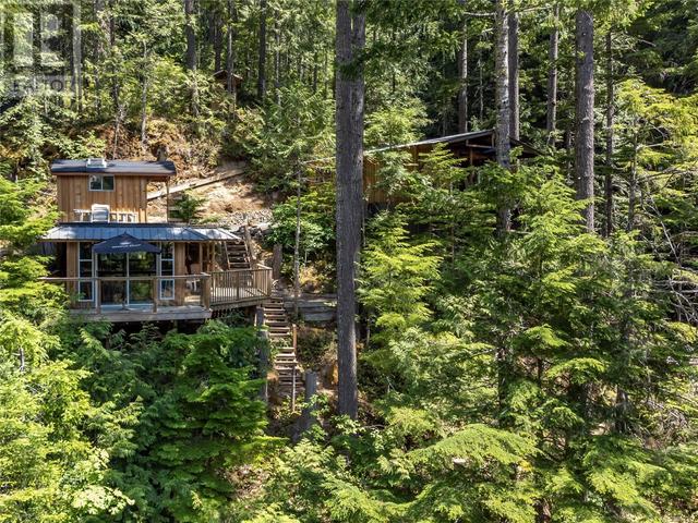 42 Baikie Dr, House detached with 2 bedrooms, 1 bathrooms and 2 parking in Strathcona D (Oyster Bay   Buttle Lake) BC | Image 52