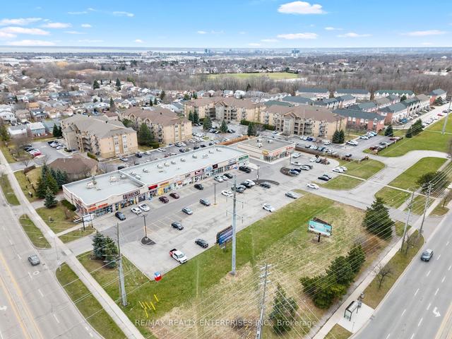 207 - 2055 Walkers Line, Townhouse with 2 bedrooms, 2 bathrooms and 2 parking in Burlington ON | Image 28