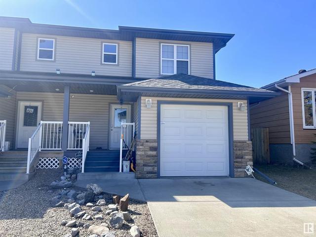 4715 49 Ave, House semidetached with 4 bedrooms, 3 bathrooms and null parking in Drayton Valley AB | Image 2