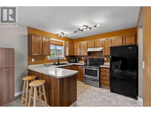 464 Mcphee St, House detached with 5 bedrooms, 2 bathrooms and 6 parking in Kelowna BC | Image 7