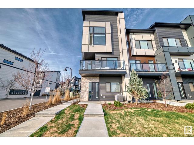 1121 Keswick Dr Sw Sw, House attached with 2 bedrooms, 2 bathrooms and null parking in Edmonton AB | Image 1