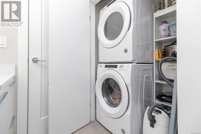 In-suite laundry with storage space | Image 40