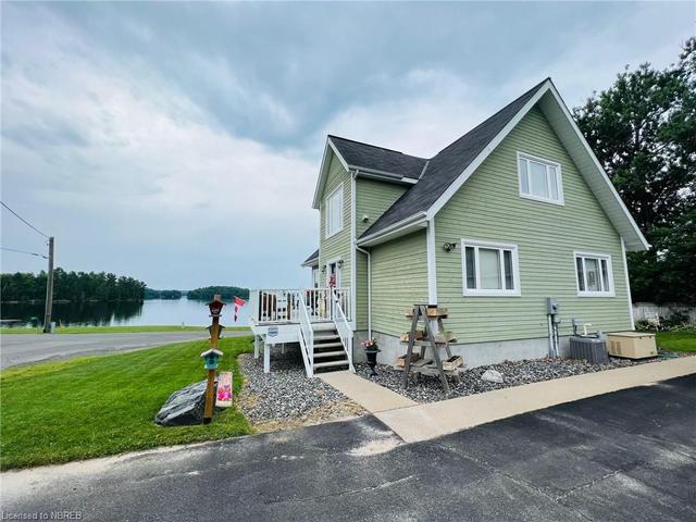 111 Wilson Lake Crescent, House detached with 3 bedrooms, 3 bathrooms and null parking in Parry Sound, Unorganized, Centre Part ON | Image 1
