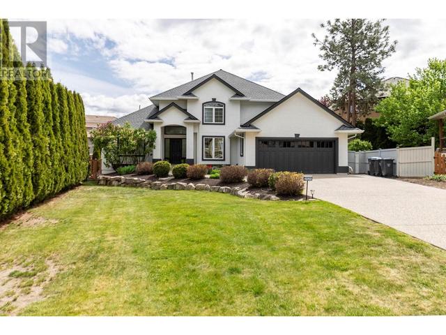 2521 Quail Pl, House detached with 5 bedrooms, 3 bathrooms and 6 parking in Kelowna BC | Image 1