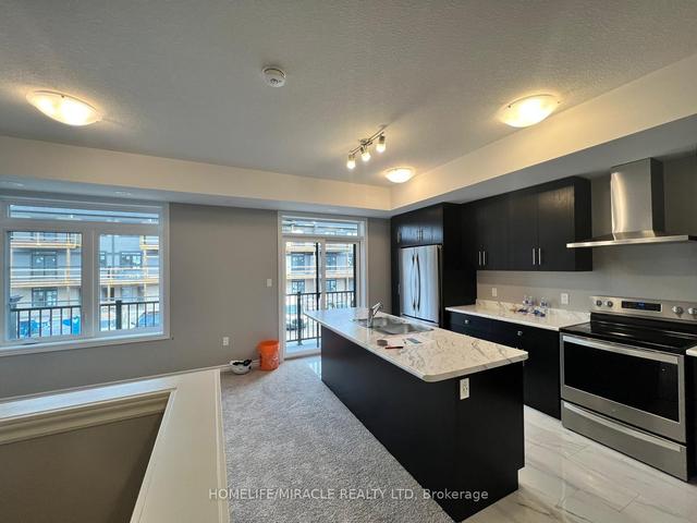 58 Lomond Lane, Townhouse with 2 bedrooms, 3 bathrooms and 1 parking in Kitchener ON | Image 1