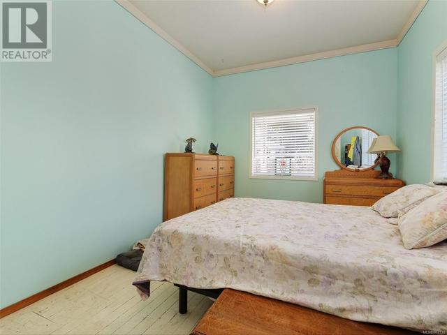Primary bedroom on main level | Image 16