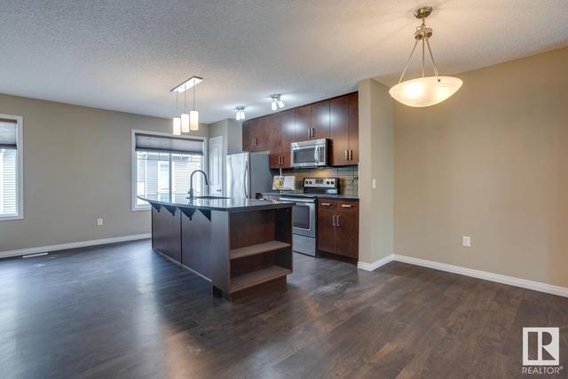 16 - 4050 Savaryn Dr Sw, House attached with 2 bedrooms, 2 bathrooms and null parking in Edmonton AB | Image 11