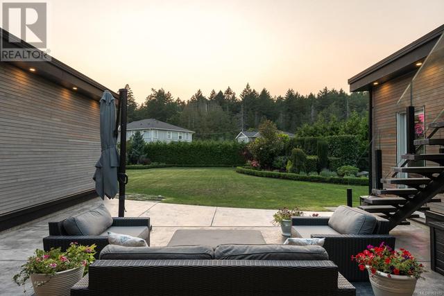 West facing backyard with open space and covered space for year round enjoyment | Image 49