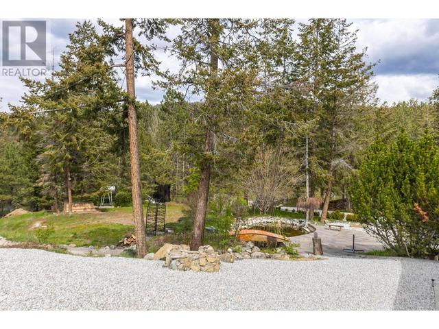 5774 Deadpine Dr, House detached with 6 bedrooms, 5 bathrooms and 3 parking in Central Okanagan BC | Image 53