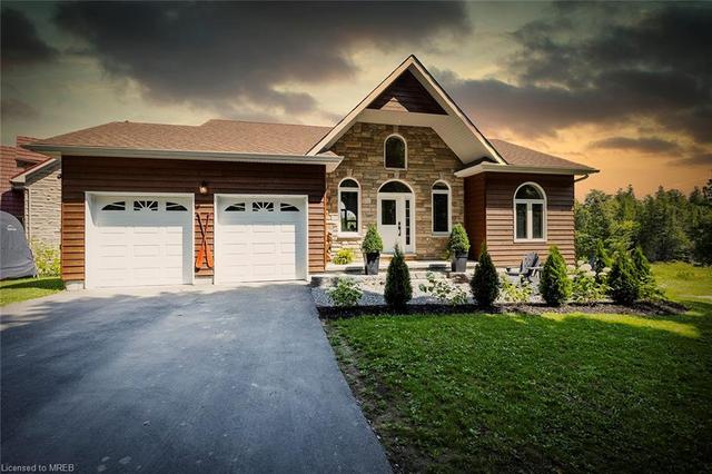 106 Juniper Isle Rd, House detached with 4 bedrooms, 2 bathrooms and null parking in Kawartha Lakes ON | Image 1