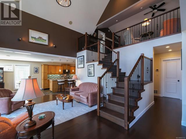 Great room and stairs to upper level | Image 4