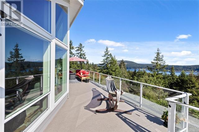 8475 Lisa Lane, House detached with 4 bedrooms, 3 bathrooms and 8 parking in Lantzville BC | Image 8