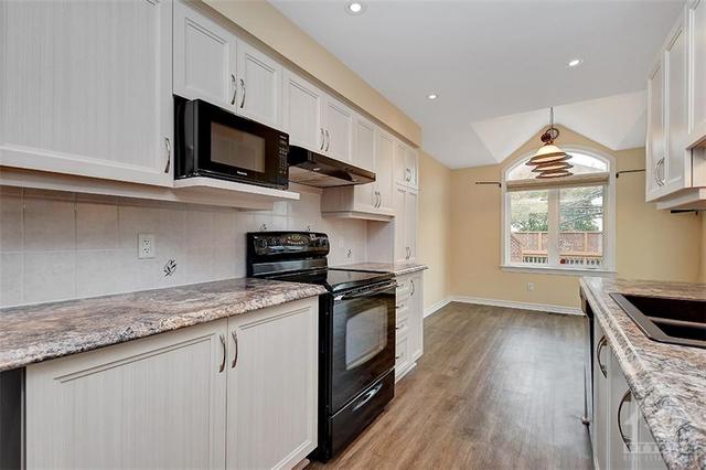 242 Horseshoe Crescent, Home with 3 bedrooms, 3 bathrooms and 2 parking in Ottawa ON | Image 10