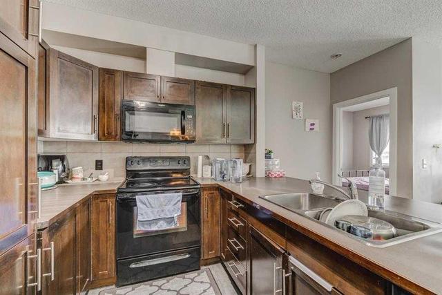 210 - 48 Panatella Road Nw, Condo with 2 bedrooms, 2 bathrooms and 1 parking in Calgary AB | Image 21