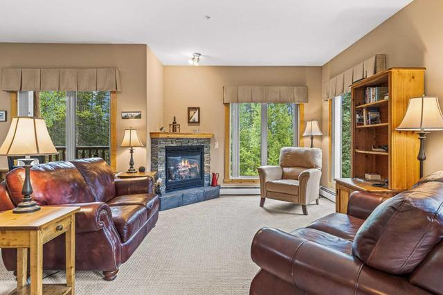 215 - 175 Crossbow Place, Condo with 2 bedrooms, 2 bathrooms and 1 parking in Canmore AB | Image 3
