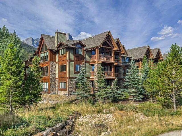 221 - 106 Stewart Creek Landing, Condo with 1 bedrooms, 2 bathrooms and 1 parking in Canmore AB | Image 1