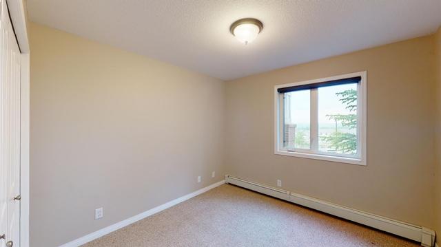 215 - 248a Grosbeak Way, Condo with 2 bedrooms, 1 bathrooms and 1 parking in Wood Buffalo AB | Image 9