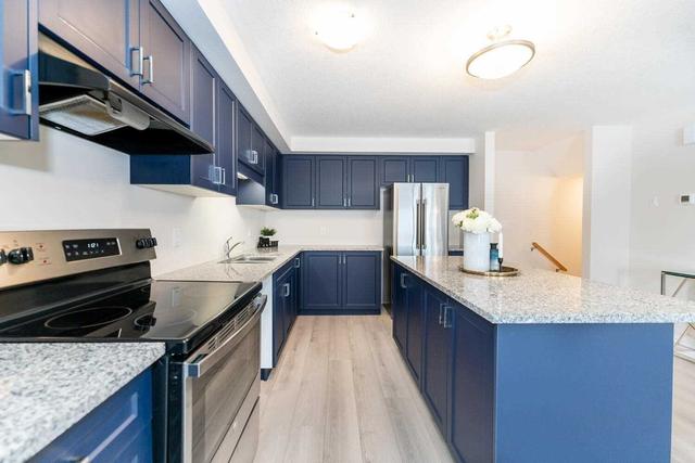 102 Progress Cres, Townhouse with 2 bedrooms, 3 bathrooms and 2 parking in Kitchener ON | Image 10