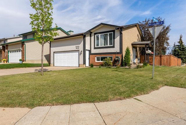 122 Woodland Drive, House detached with 4 bedrooms, 2 bathrooms and 4 parking in Wood Buffalo AB | Image 1