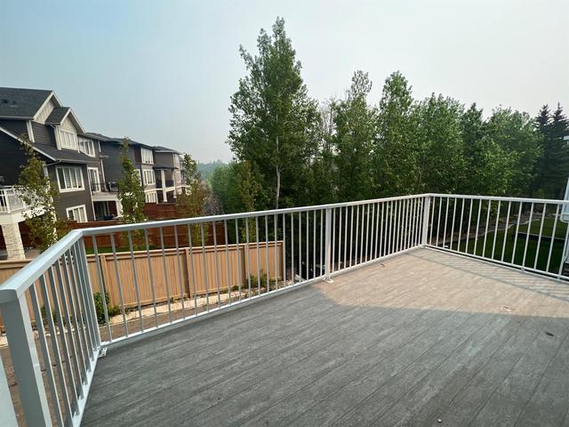 10 Rock Lake View Nw, House detached with 4 bedrooms, 4 bathrooms and 4 parking in Calgary AB | Image 40