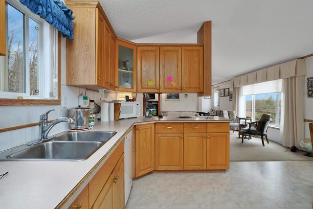 402 - 1219 Township Road, House detached with 3 bedrooms, 3 bathrooms and 10 parking in Lacombe County AB | Image 9